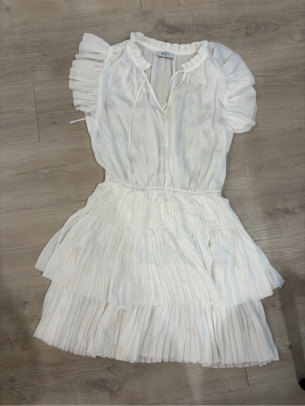 The Reset White Ruffled Pleated Mini Dress